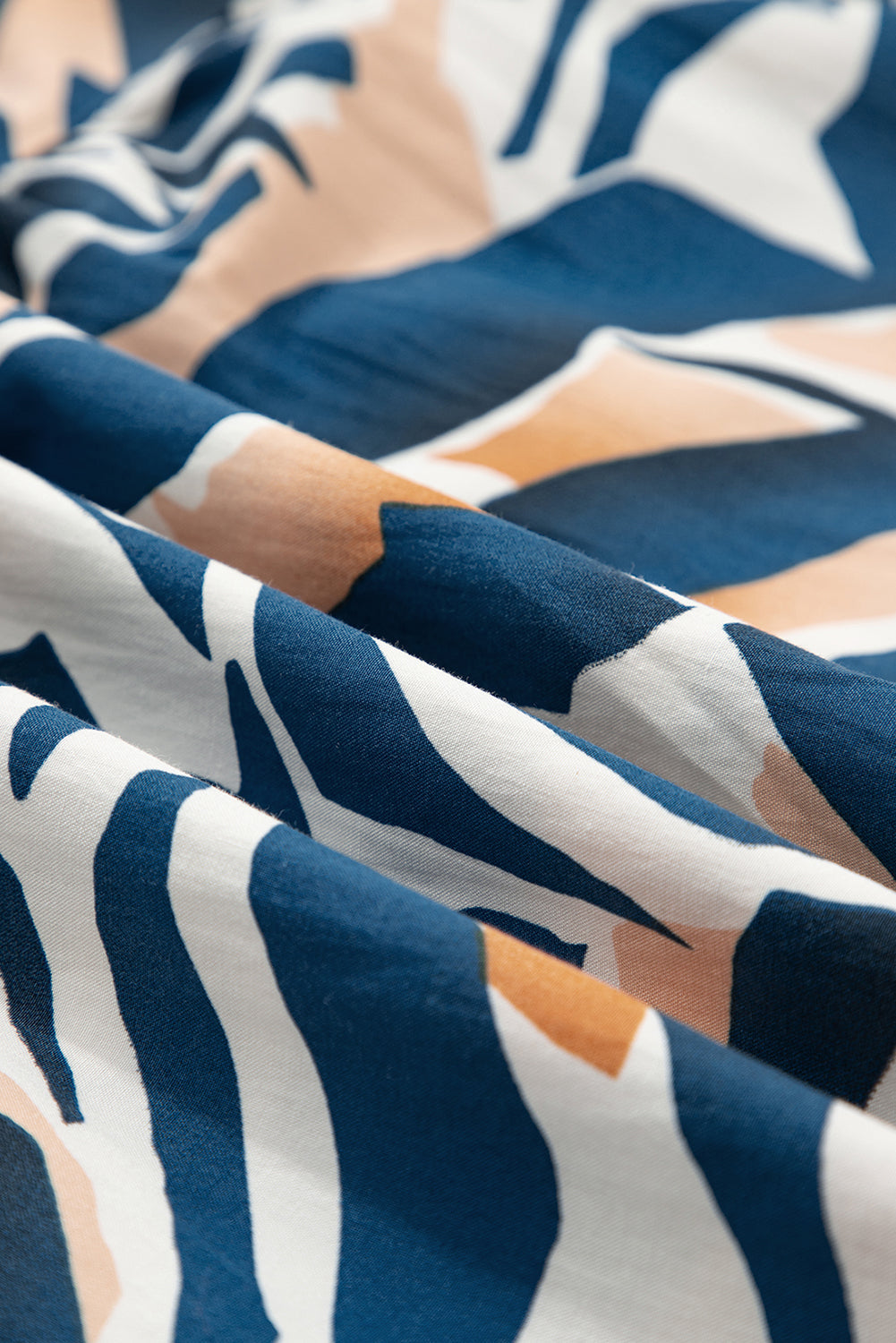 Zebra Tied Front Puff Sleeve Top